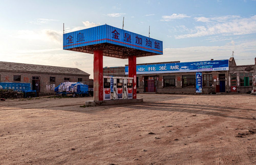 TWO COLORED GAS STATION. ZHONGHAO VILLAGE, INNER MONGOLIA
