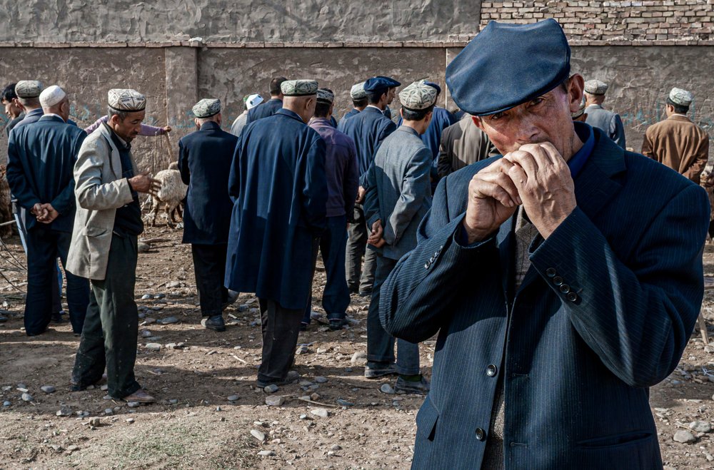 TOBACCO TIME. LIVESTOCK MARKET, KASHGAR